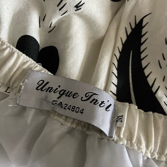 Unique Int’l - Picture 4 of 4